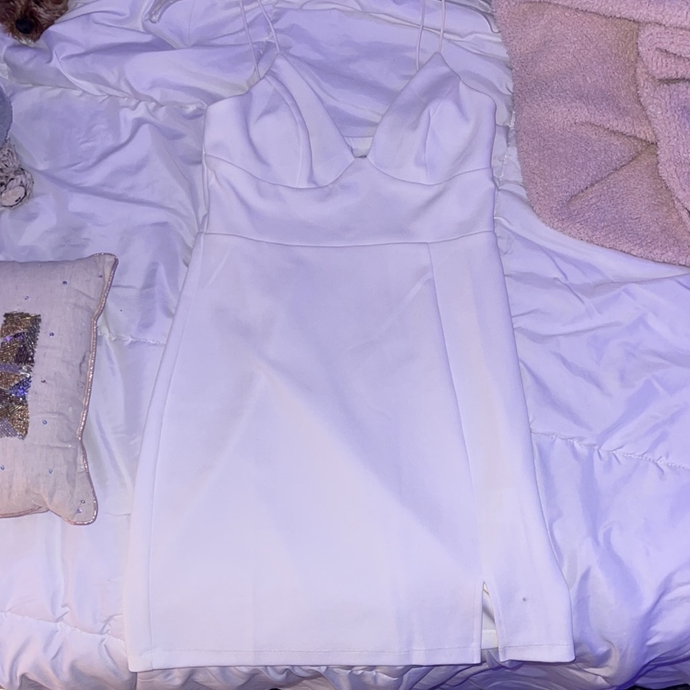 Princess Polly size 8 white bodycon clubbing dress. Never used. No tag.